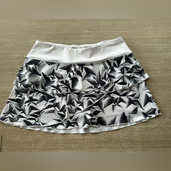 Women’s black and white and gray Fila ruffled tennis/golf skort. Size medium. - Picture 1 of 5